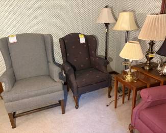Wingback chairs, nested tables, lamps
