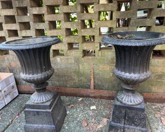 D30-$240. Pair of Cast Iron Urns