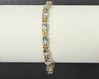 14K Gold Blue Topaz Tennis Bracelet 17 Oval Stone, weighs 6.58g