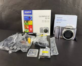 Olympus SZ14 14MP Digital Camera 24x Optical Zoom Silver New Unused w Box Extras