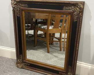 Wood framed wall mirror