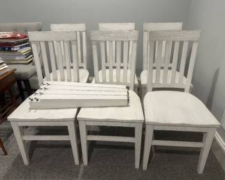 with 6 chairs (legs have been removed for easy transportation and shown on chairs)