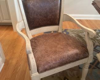 Includes 2 Walter E. Smithe captains chairs and 4 Walter E. Smithe side chairs