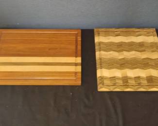 A Pair Of Distinctive Hand Crafted Cutting Boarda