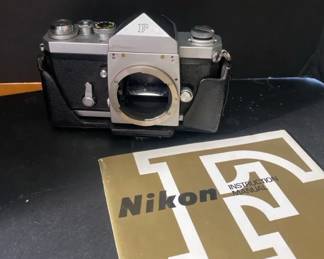 Nikon F Camera with Sunpak Flash Film Case, no lense was found.