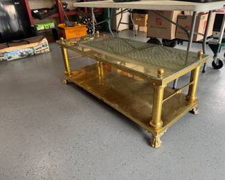 A really cool decorative brass clawfoot coffee table, 2 tier