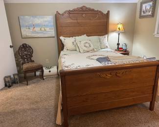 Stunning carved solid oak full size bed, high headboard