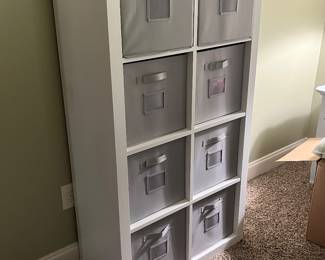 Cabinet with cloth baskets. Cabinet can go vertical or horizontal. Like new. $100