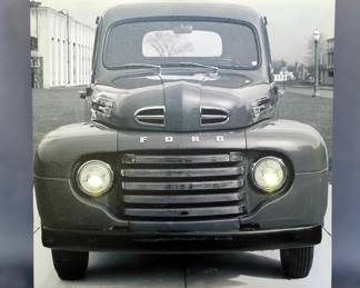 Ford Art Pieces, 1940s Ford Truck Print On Canvas With Lighted Headlights, 15" x 15", 1940s Ford Truck Print On Canvas, 16" x 12", 1940 Ford Deluxe Sedan Delivery Print On Canvas, 20" x 16", And Framed Textured Fabric Ford Logo Art Piece, 17" x 9"