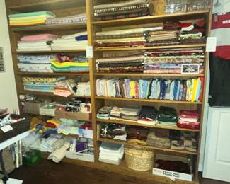 HUGE SHELF FULL OF FABRIC BOLTS!
