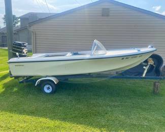1965 Mercury 500 - 50hp outboard on trailer - the boat was barn kept and has not seen water since the mid 70's. Motor runs but needs reeds.