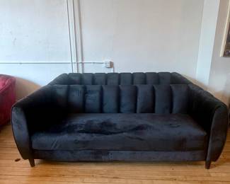 Pair of black velvet sofas
