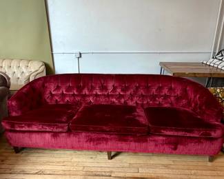 Crushed burgundy velvet sofa