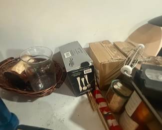 Assorted copper pots, kitchen items, and miscellaneous household goods