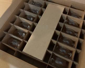 Boxed set of crystal stemware and glassware in original cardboard dividers