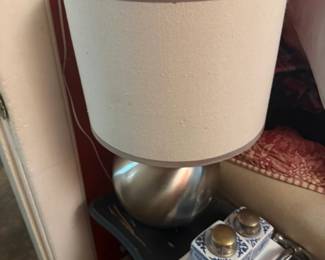 Chrome table lamp with white shade and vintage small appliances