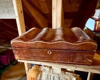 vintage mid-century Italian-style brown leather decorative box featuring a distinctive wavy, serpentine lid