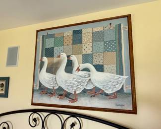 vintage Americana folk art oil on canvas painting featuring a line of white geese walking in front of a patchwork quilt, signed by the artist "Huntington"