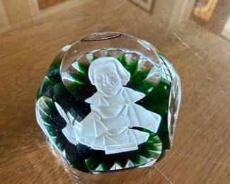 vintage Baccarat crystal paperweight featuring a white sulphide cameo of President Andrew Jackson set against an emerald green star-cut glass base