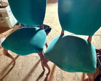 pair of vintage teal velvet side chairs featuring elegant curved cabriole legs