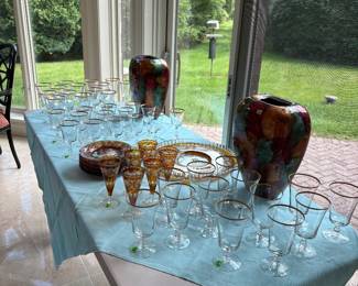 Gold rimmed glassware never used, and amber Bohemian cut to clear Crystal