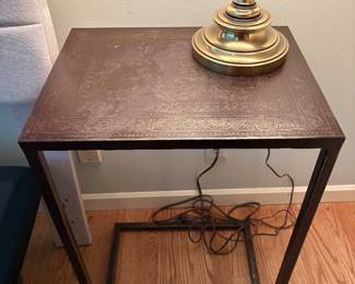 Metal tooled table