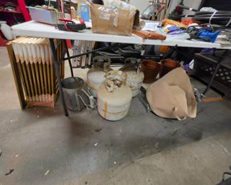 Gold frames, tanks, tools