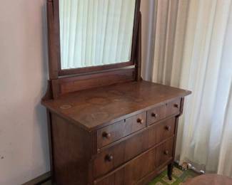 Antique American Empire-style dark wood dresser with attached upright, pivoting mirror