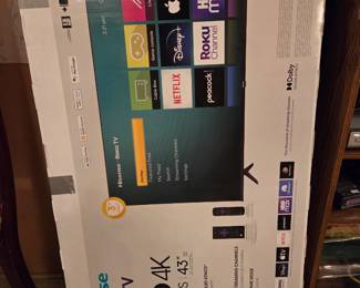 Hisense Roku TV, UHD 4K R7 Series, 43 inch, shown new in the original box.