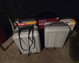 Pair of portable multi-purpose utility space heaters.