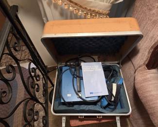 Vintage EBI Bi-Osteogen System bone fracture treatment unit by Electro-Biology Inc, complete in its fitted hard-shell carrying case with original instruction booklet and cables. An unusual piece of vintage medical equipment for the collector.