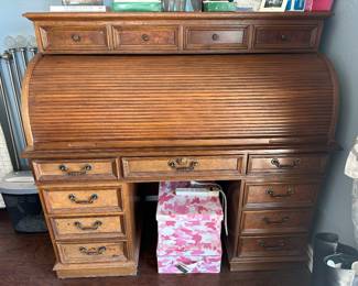 Roll top desk shown closed