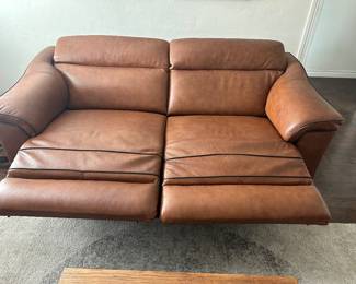 Dual recliner shown laid back