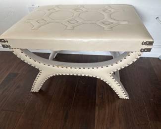 Leather studded bench seat is 16 x 24“