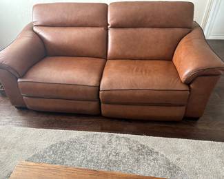 Dual recliner love seat sofa is 82 inches across