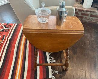 Drop leaf side table shown with leaves down
