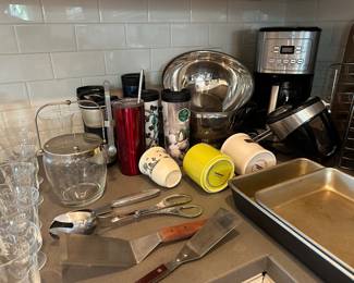 Cuisinart coffee maker, Starbucks mugs and water bottles