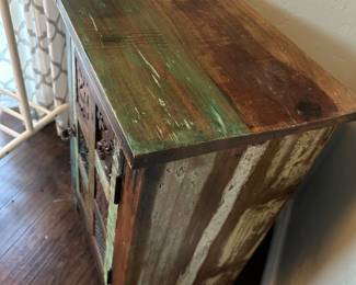 Side view of painted cabinet