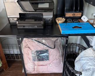 HP printer, Tommy Bahama comforter, black student desk with slide and drop top so it can be 18 inches wide or 36 inches wide
