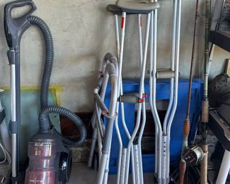 Panasonic vacuum, crutches, walker, blue large rolling dolly, fishing poles