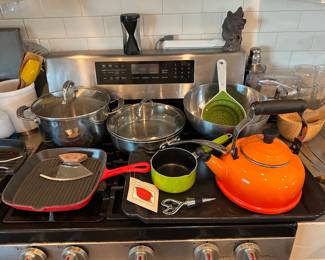 Le Creusete tea kettle, Cuisinart new griddle pan with rag, pots, and pans