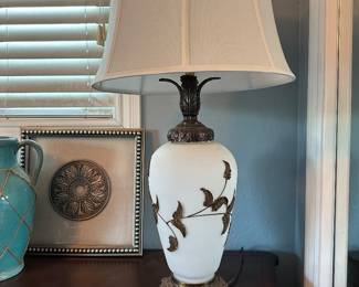 Tall table lamp frosted glass base has metal decoration 33 inches tall