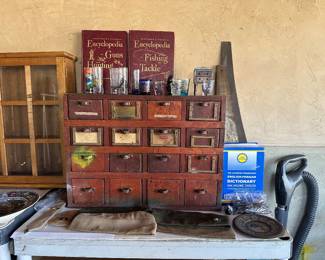 Rustic 16 drawer cabinet with divided interior drawers, shot glass collection, marine hats, 
