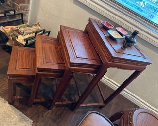Four Asian style stacking tables largest is 13.5 deep by 19 inches wide by 27.5 high