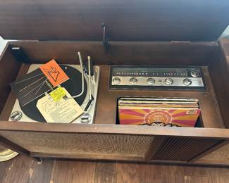 Inside left of stereo cabinet with Philco stereo and turntable which sadly does not work, suggest replacing the super old electrical cord
