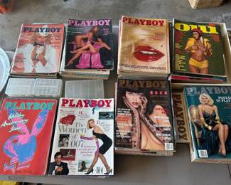 Playboy magazines, 1970s to 2000, stacked by year plus Oiu, etc.