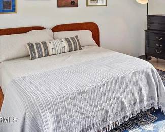 Bedroom Furniture & Décor – Upholstered Bed, Black Dresser, Rug & More