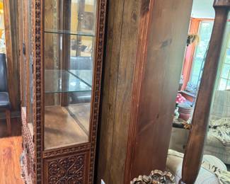 #11 - $495 - Peruvian carved curio cabinet with mirror back 30x16x70 three shelves & cabinet bottom