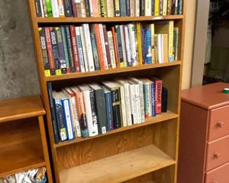 157 woodbookshelfwithassortedbooks