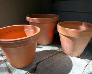 511 twoterracottaplantpotsandoneplasti